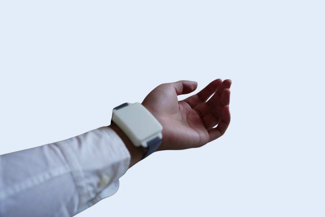 The Varuna V4 prototype worn on an outstretched wrist